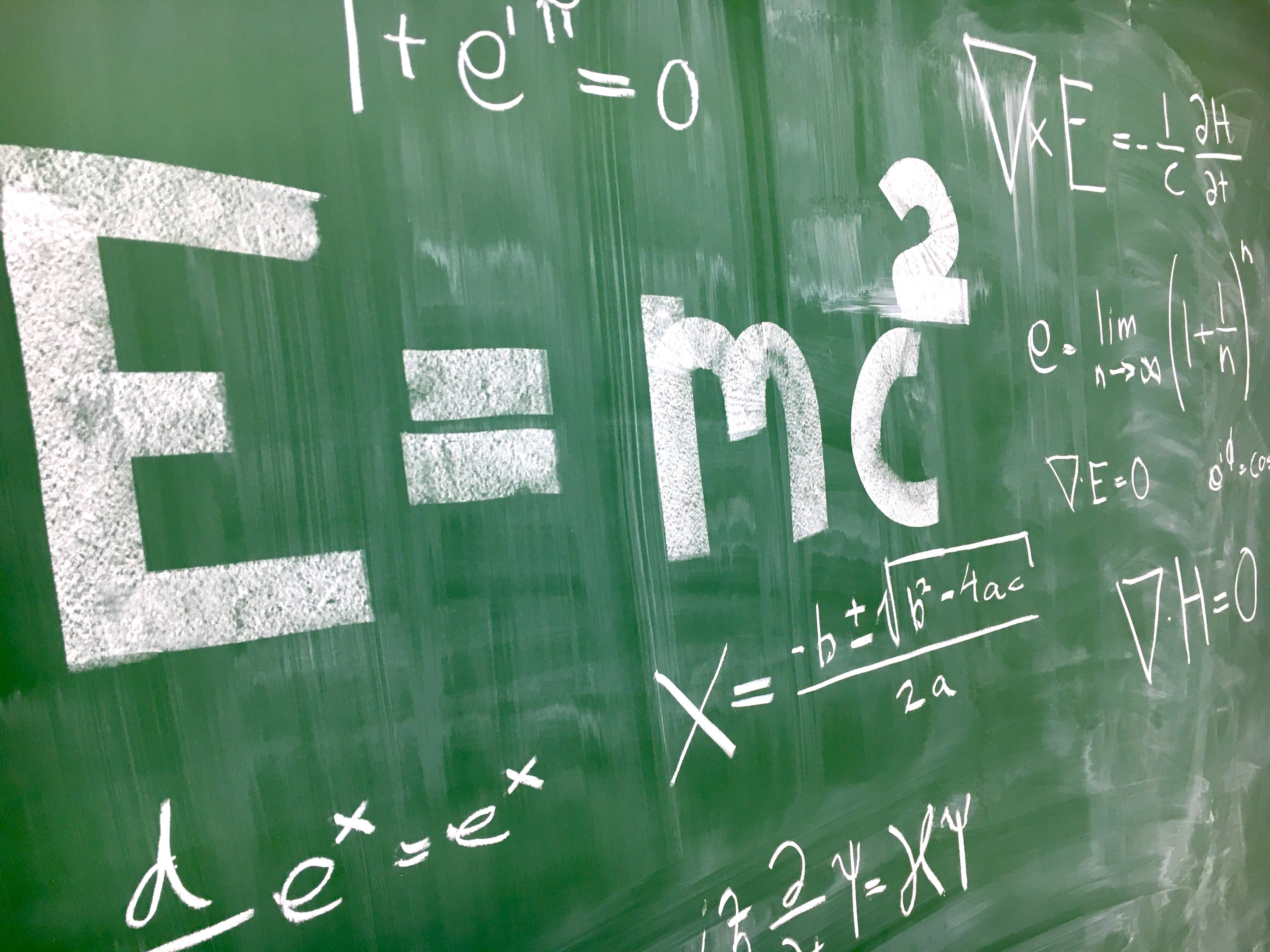 Math and science formulas on a chalkboard representing technical thinking skills